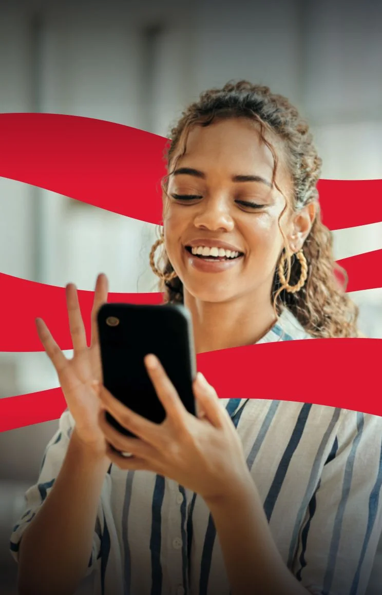 Empower artwork with a person using a phone, framed by red ribbons